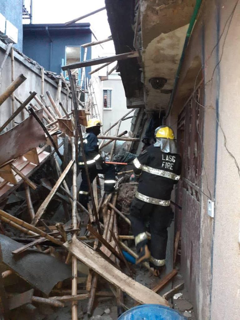 Rescue officials at Mangoro building collapse site in Lagos