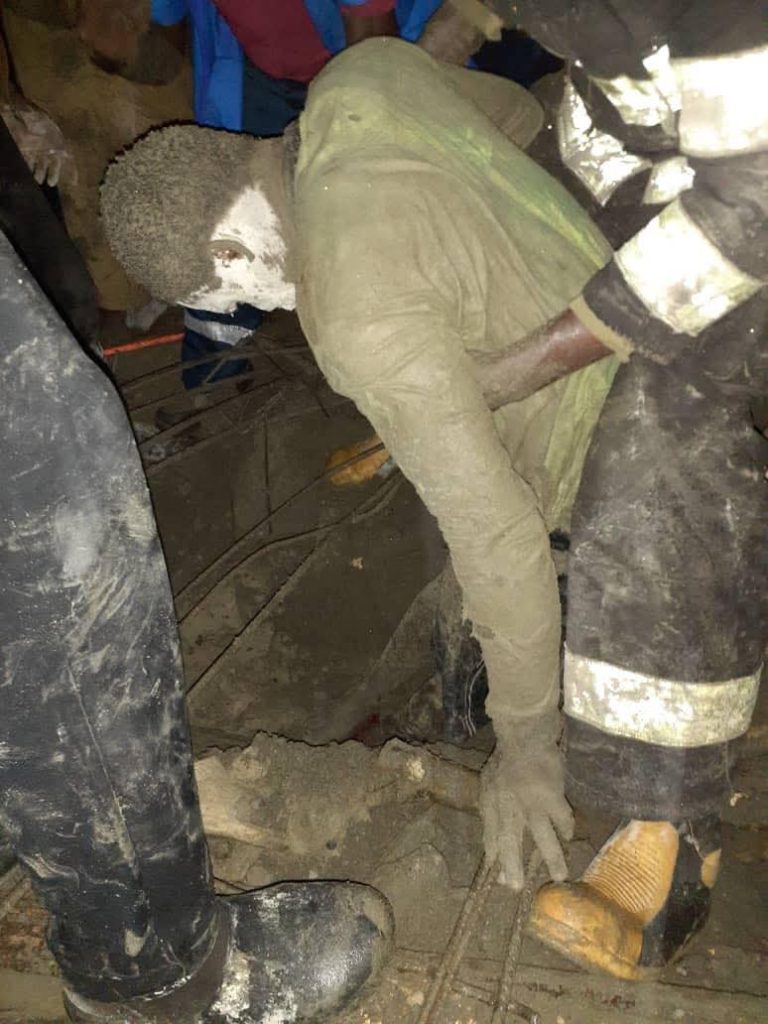 Rescue officials at Mangoro building collapse site in Lagos