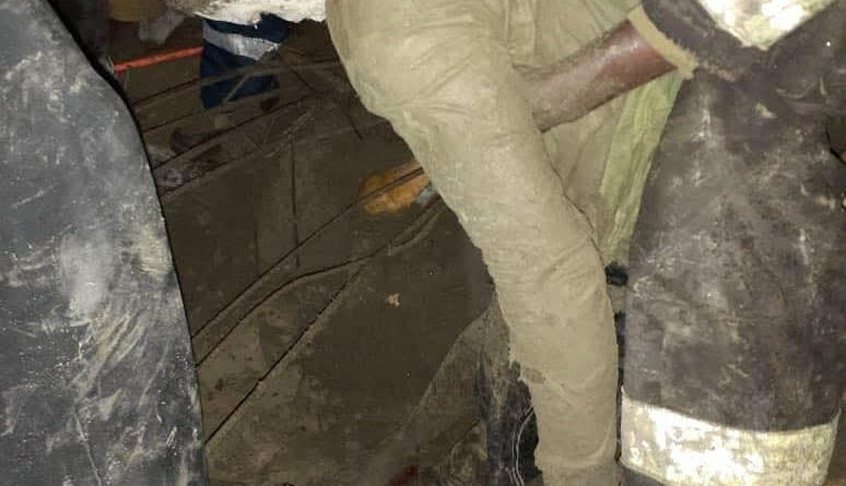 Rescue officials at Mangoro building collapse site in Lagos